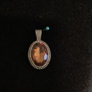 Elegant Silver and Brown Pendant